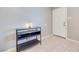 Bright entryway with tiled floor, console table, and white door at 641 Pecos Way, Las Vegas, NV 89121