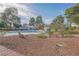 Relaxing community pool area with bench at 641 Pecos Way, Las Vegas, NV 89121