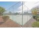 Community tennis court with chain link fence at 641 Pecos Way, Las Vegas, NV 89121