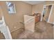 Upstairs hallway leading to bedrooms and bathroom at 10445 Trout River St, Las Vegas, NV 89178