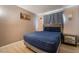 Bedroom with double bed and light wood nightstand at 2571 Pacific Ave, Las Vegas, NV 89121