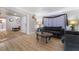 Living room with gray couches, a coffee table, and hardwood floors at 2571 Pacific Ave, Las Vegas, NV 89121