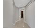 Long hallway with tile flooring and access to closets at 2747 Paradise Rd # 2206, Las Vegas, NV 89109