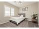 Bedroom with queen bed, window, and ceiling fan at 3112 Madame Plantier Ave, North Las Vegas, NV 89081