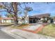 Single-story home with a red brick driveway at 3208 Calle De El Cortez, Las Vegas, NV 89102