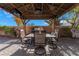 Relaxing backyard patio with pergola, seating, and grill at 4339 Pittsfield St, Las Vegas, NV 89115