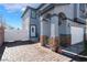 Gray two-story house with stone pillars and a paved driveway at 4339 Pittsfield St, Las Vegas, NV 89115