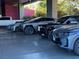 Luxury cars parked in a lot at 4381 W Flamingo Rd # 3002, Las Vegas, NV 89103