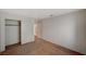 Empty bedroom with carpeted floors and sliding door closet at 7328 Wandering St, Las Vegas, NV 89131