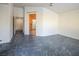 Gathering Room with stained concrete floor and access to hallway at 7630 Stetson Bluff Ave, Las Vegas, NV 89113