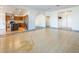 Open kitchen with island and stainless steel appliances visible from the living room at 7630 Stetson Bluff Ave, Las Vegas, NV 89113