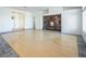 Bright living room with hardwood floors and built-in shelving unit at 7630 Stetson Bluff Ave, Las Vegas, NV 89113