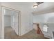 Upstairs hallway with carpet and access to bedrooms at 8300 Bermuda Beach Dr, Las Vegas, NV 89128