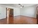 Spacious bedroom with wood flooring and ceiling fan at 8317 Sky Canyon Ct, Las Vegas, NV 89128