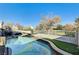 Inviting pool with patio and backyard landscaping at 10146 Robins Hollow Rd, Las Vegas, NV 89183