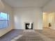 Bright living room with fireplace and carpet flooring at 1636 Lorna Dr, Henderson, NV 89011