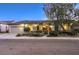 Single-story house with landscaped yard, attached garage, and desert landscaping at 1833 Prichard Ave, Henderson, NV 89052