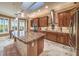 Island kitchen boasts granite counters and stainless steel appliances at 1833 Prichard Ave, Henderson, NV 89052