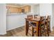 Dining area with wood table and chairs near kitchen at 2004 Mesquite Ln # 304, Laughlin, NV 89029