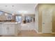 Modern kitchen with white cabinets and a large island at 2094 Sawtooth Mountain Dr, Henderson, NV 89044