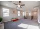 Upstairs bonus room with lots of natural light and a ceiling fan at 23 Cresta Villa Ct, Henderson, NV 89011