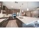 Modern kitchen with stainless steel appliances and large island at 23 Cresta Villa Ct, Henderson, NV 89011