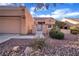 Single-story home with attached garage and nicely landscaped front yard at 2505 Showcase Dr, Las Vegas, NV 89134