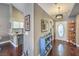 Bright entryway with hardwood floors, built-in shelving, and views to kitchen at 3766 Cape Solitude St, Las Vegas, NV 89147