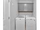 Laundry room with washer and dryer, cabinets at 4615 Adonis Blue St, North Las Vegas, NV 89031