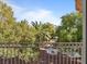 Balcony overlooks a courtyard with trees and plants at 5000 Red Rock St # 240, Las Vegas, NV 89118