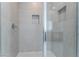 Clean shower with glass enclosure and neutral tile at 5733 Granite Landing Ct, Las Vegas, NV 89131