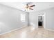 Bedroom with tile floors, ceiling fan and bathroom access at 917 Bonita Ave, Las Vegas, NV 89104