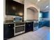 Modern kitchen with stainless steel appliances and granite countertops at 9886 Gold Coin Ct, Las Vegas, NV 89141