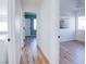 Light and airy hallway with doors to bedrooms at 10635 Dawns Mist Ave, Las Vegas, NV 89129