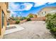 Landscaped backyard with gravel and a patio area at 109 Short Ruff Way, Las Vegas, NV 89148