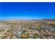 Aerial view showing the home, neighborhood and mountain views at 1571 Sundown Dr, Henderson, NV 89002