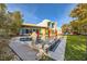 Backyard oasis with pool, lawn, and Buddha statue at 17 Cedar Chase Dr, Henderson, NV 89052