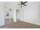 Bright bedroom, featuring a mirrored closet and a ceiling fan at 170 Story Ave, Pahrump, NV 89060