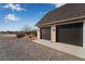 Two-car garage with dark brown doors at 170 Story Ave, Pahrump, NV 89060