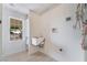 Laundry room with utility sink and built-in shelving at 170 Story Ave, Pahrump, NV 89060