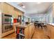 Open concept kitchen with island and breakfast nook at 1732 Double Arch Ct, Las Vegas, NV 89128