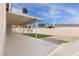 Covered patio with artificial turf and gravel landscaping at 1824 Navarre Ln, Henderson, NV 89014