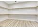 Spacious walk-in closet with ample shelving and hanging rods at 1928 Oliver Springs St, Henderson, NV 89052