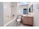 Clean bathroom with light wood cabinets and a bathtub at 2133 King Mesa Dr, Henderson, NV 89012