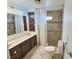 Bathroom with double sinks, shower, and tile floors at 3050 S Torrey Pines Dr, Las Vegas, NV 89146