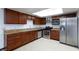 Kitchen with stainless steel appliances and wood cabinets at 3719 Centennial Cir, Las Vegas, NV 89121