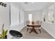 Bright dining room with a wooden table and six chairs at 3759 Tundra Swan St, Las Vegas, NV 89122