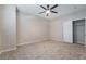 Well-lit bedroom with ceiling fan and large closet at 5415 W Harmon Ave # 1051, Las Vegas, NV 89103