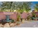 Landscaped backyard with a water fountain and decorative plants at 6257 Olde Lockford Ct, Las Vegas, NV 89139