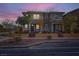 Two-story townhouses with brick accents and landscaped yards at 754 N Water St, Henderson, NV 89015